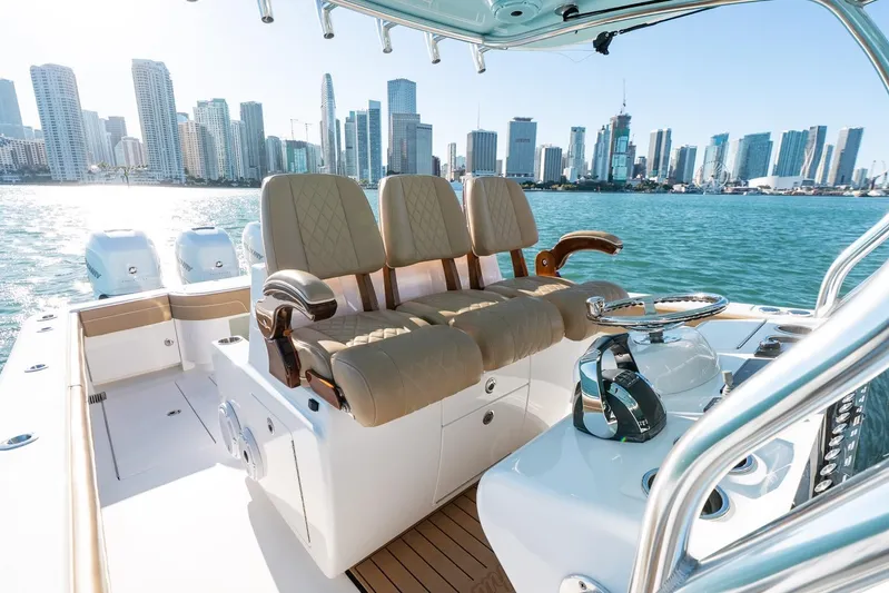 Wahoo Whitney Yacht Photos Pics 2022 Valhalla Boatworks V-37 on water with city skyline in background.