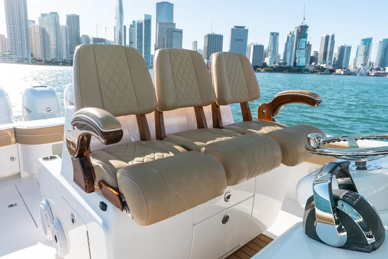 Wahoo Whitney Yacht Photos Pics 2022 Valhalla Boatworks V-37 luxury seating with city skyline backdrop.