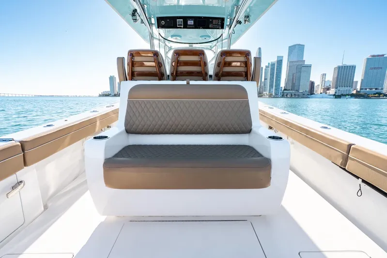 Wahoo Whitney Yacht Photos Pics 2022 Valhalla Boatworks V-37 luxury seating with city skyline in background.