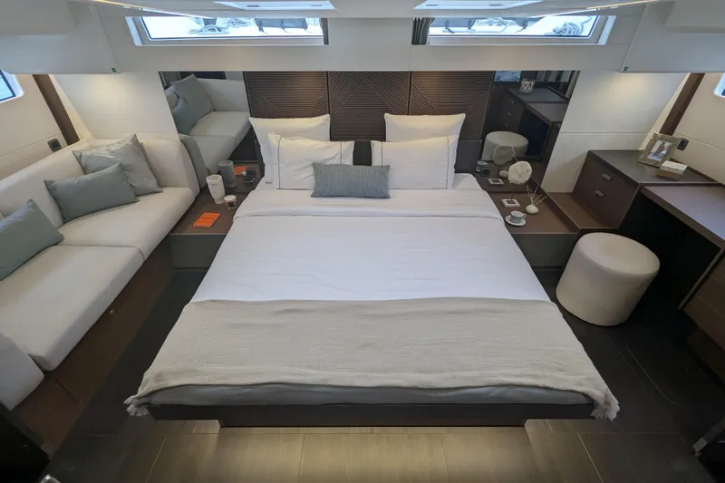  Yacht Photos Pics Luxurious 2024 Prestige M48 yacht bedroom with modern decor and elegant furnishings.