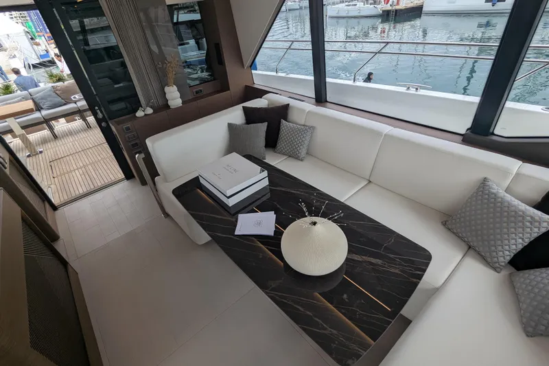  Yacht Photos Pics Luxurious interior of 2024 Prestige M48 yacht with elegant seating and modern decor.