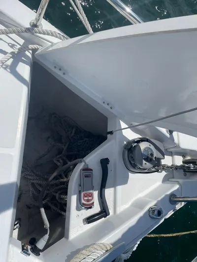 Shaz Yacht Photos Pics Jeanneau Sun Odyssey 410 sailboat deck, featuring anchor locker and winch, 2020 model.