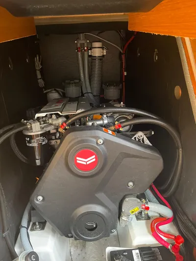 Shaz Yacht Photos Pics Engine compartment of 2020 Jeanneau Sun Odyssey 410 sailboat, showcasing mechanical components.
