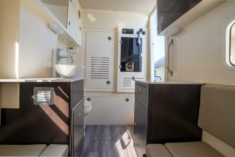  Yacht Photos Pics 2023 Scout 355 LXF interior with modern amenities and sleek design.