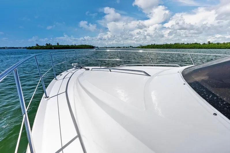 Megusta Yacht Photos Pics 2007 Sea Ray 44 Sedan Bridge cruising on a sunny day.