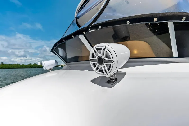 Megusta Yacht Photos Pics Close-up of 2007 Sea Ray 44 Sedan Bridge speaker on deck, with clear sky background.