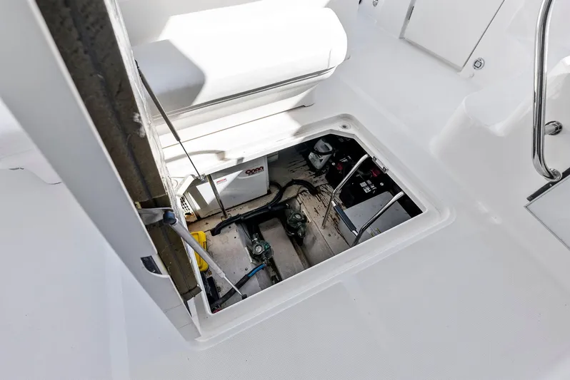 Megusta Yacht Photos Pics Engine compartment of 2007 Sea Ray 44 Sedan Bridge yacht, showcasing mechanical components.