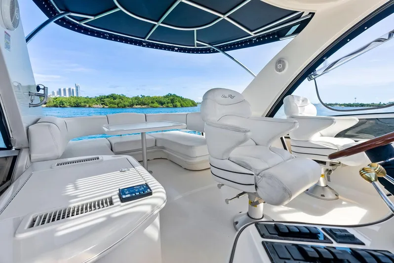 Megusta Yacht Photos Pics Luxurious 2007 Sea Ray 44 Sedan Bridge interior with plush seating and scenic water view.