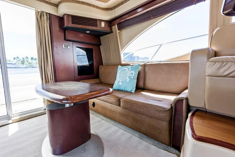 Megusta Yacht Photos Pics Luxurious interior of 2007 Sea Ray 44 Sedan Bridge yacht with plush seating.
