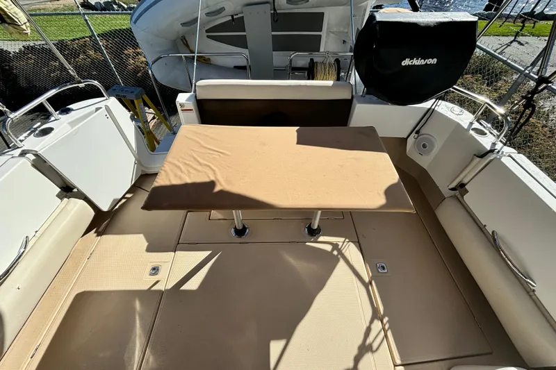  Yacht Photos Pics 2015 Ranger Tugs R-31 CB boat deck with table and seating area.