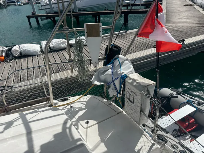 Talisa Yacht Photos Pics Sailboat docked at marina with Canadian flag, Hunter 45cc, 2006 model.
