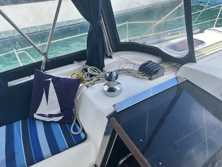 Talisa Yacht Photos Pics Cozy cockpit of 2006 Hunter 45cc sailboat with nautical decor and ropes.