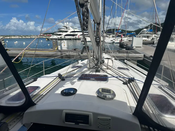 Talisa Yacht Photos Pics Sailboat deck view at marina, Hunter 45cc, 2006 model, clear skies, calm waters.