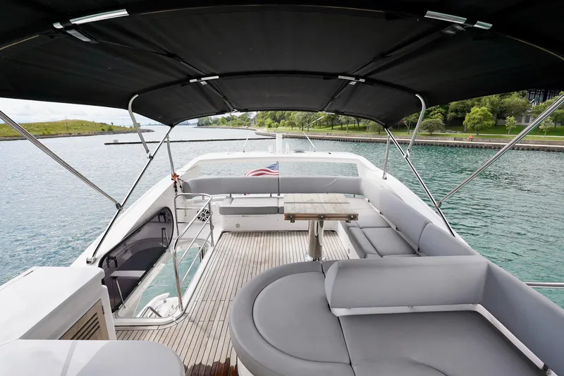  Yacht Photos Pics Luxurious 2019 Sunseeker Manhattan 66 yacht with spacious deck and elegant seating area.