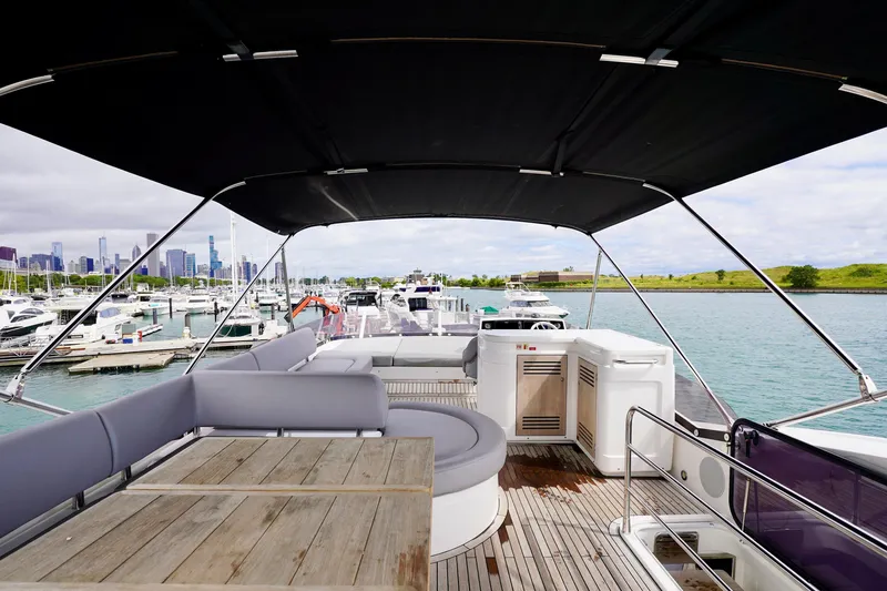  Yacht Photos Pics Luxurious 2019 Sunseeker Manhattan 66 yacht with spacious deck and scenic marina view.