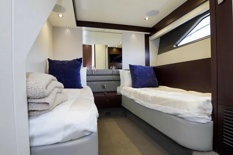  Yacht Photos Pics Luxurious twin cabin interior on 2019 Sunseeker Manhattan 66 yacht.