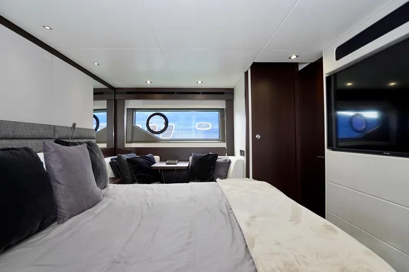  Yacht Photos Pics Luxurious bedroom interior of 2019 Sunseeker Manhattan 66 yacht with modern decor.