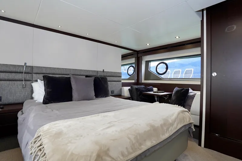  Yacht Photos Pics Luxurious bedroom interior of 2019 Sunseeker Manhattan 66 yacht with modern decor.