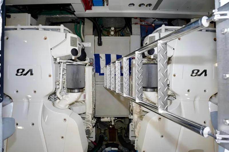  Yacht Photos Pics Engine room of 2019 Sunseeker Manhattan 66 yacht, featuring twin V8 engines.