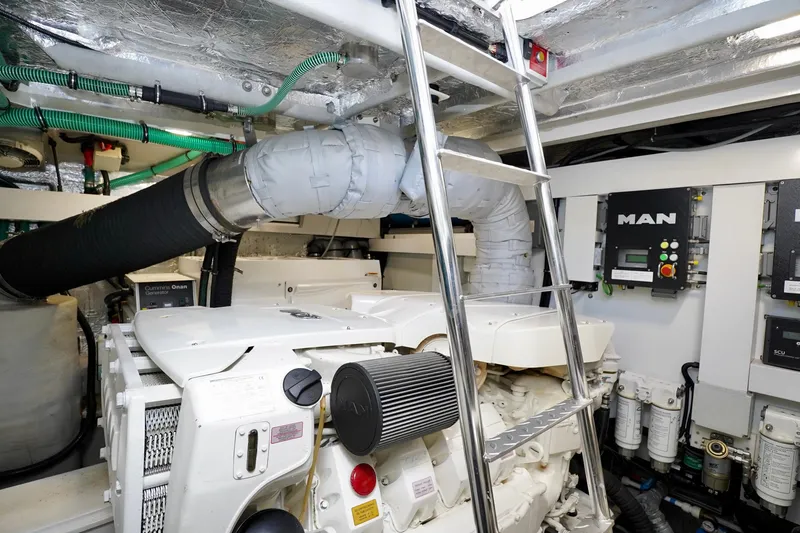  Yacht Photos Pics Engine room of 2019 Sunseeker Manhattan 66 yacht with MAN control panel and ladder.