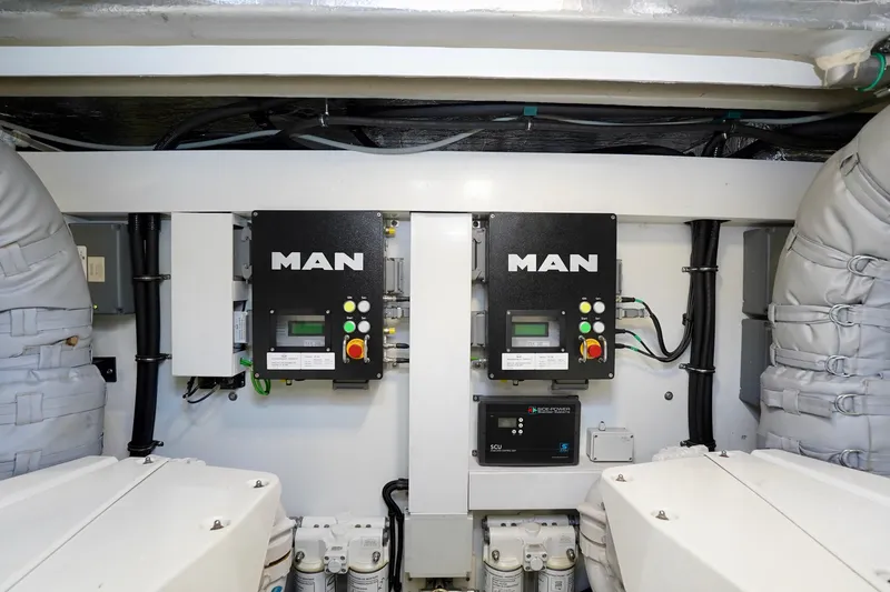  Yacht Photos Pics Engine room of 2019 Sunseeker Manhattan 66 yacht with MAN control panels.