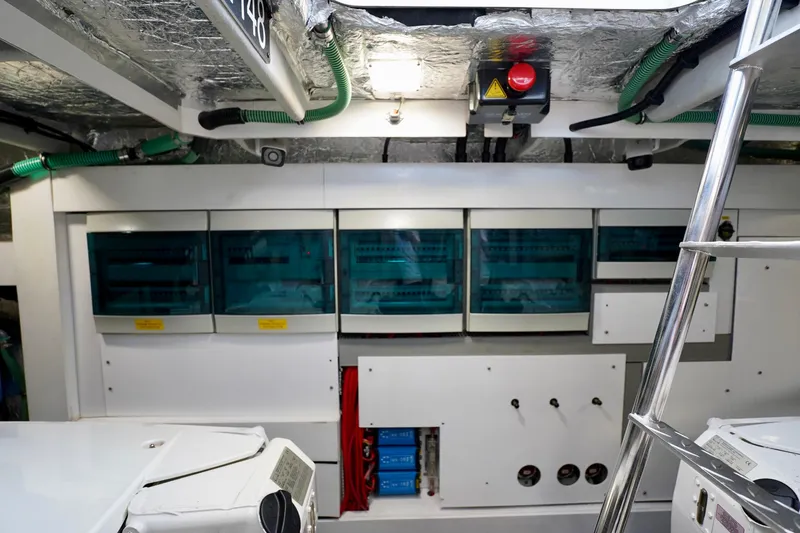  Yacht Photos Pics Engine room of 2019 Sunseeker Manhattan 66 yacht with control panels and equipment.