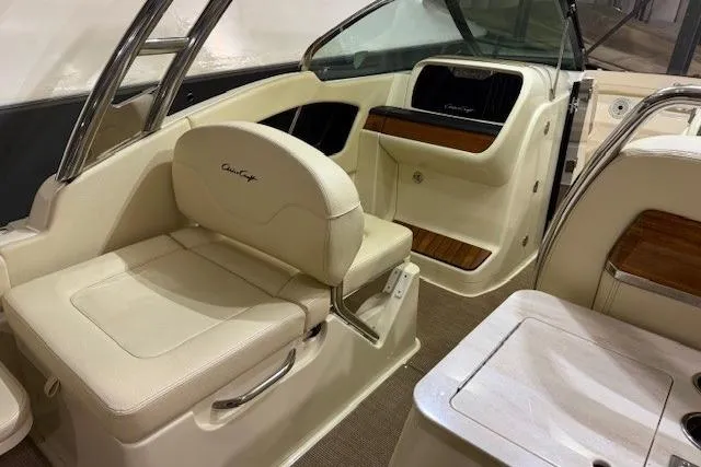  Yacht Photos Pics 2023 Chris-Craft Calypso 28 interior with beige seating and wood accents.