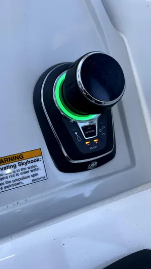  Yacht Photos Pics Evolve 400HT 2022 control panel with illuminated knob and warning label.