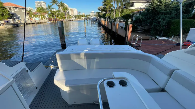  Yacht Photos Pics Luxury Evolve 400HT yacht, 2022 model, docked by a scenic waterfront.