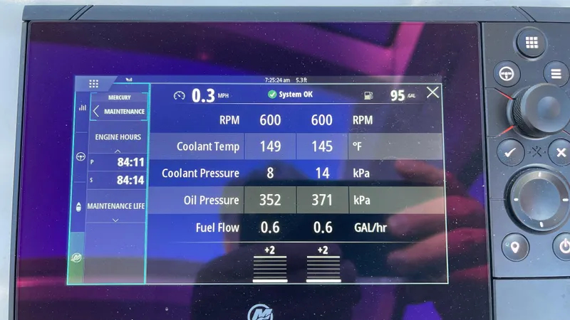  Yacht Photos Pics Evolve 400HT 2022 dashboard displaying engine metrics: RPM, coolant temp, pressure, and fuel flow.