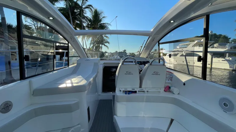  Yacht Photos Pics Interior view of 2022 Evolve 400HT yacht with sleek design and spacious seating.