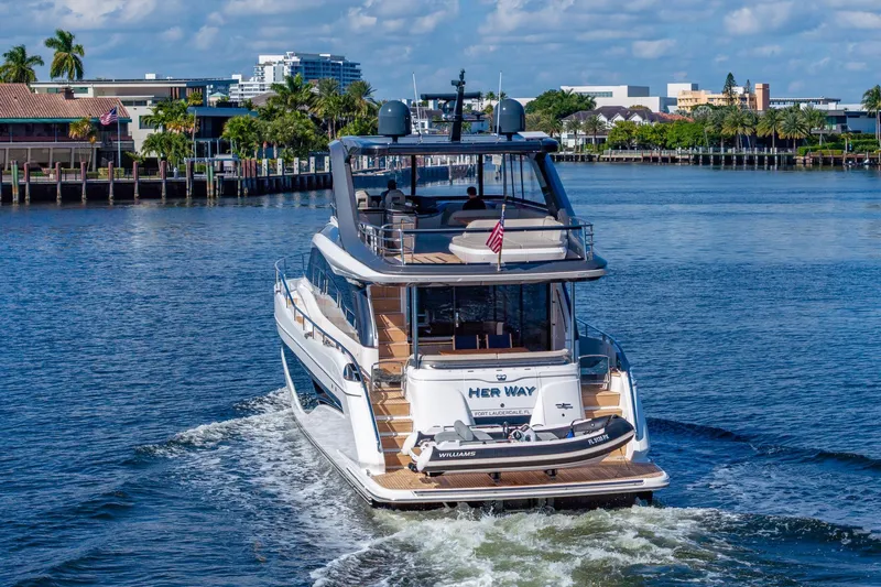 Her Way Yacht Photos Pics Luxury 2023 Princess Y72 yacht cruising in scenic waterfront setting.