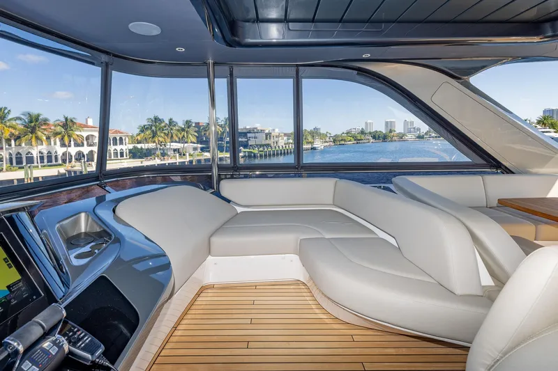 Her Way Yacht Photos Pics Luxurious interior of 2023 Princess Y72 yacht with waterfront view.