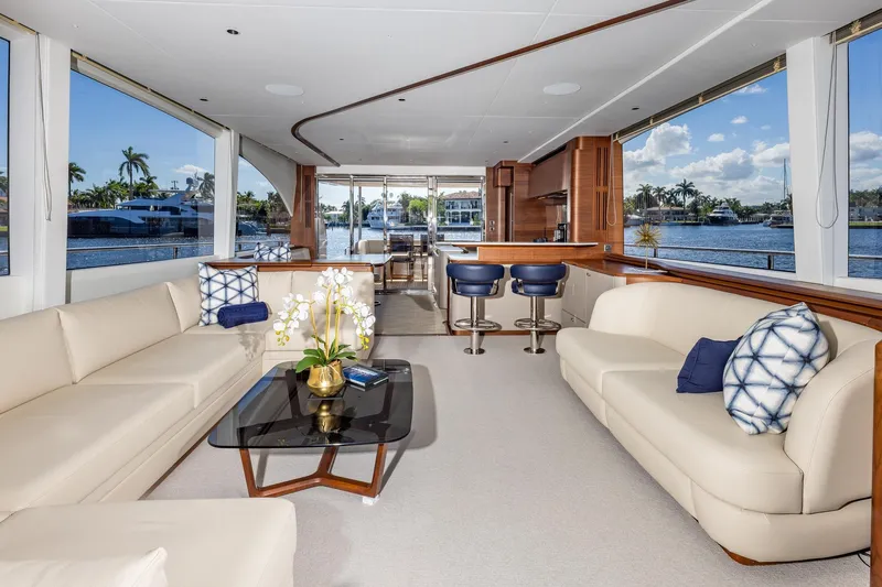 Her Way Yacht Photos Pics Luxurious interior of 2023 Princess Y72 yacht with elegant seating and scenic water views.