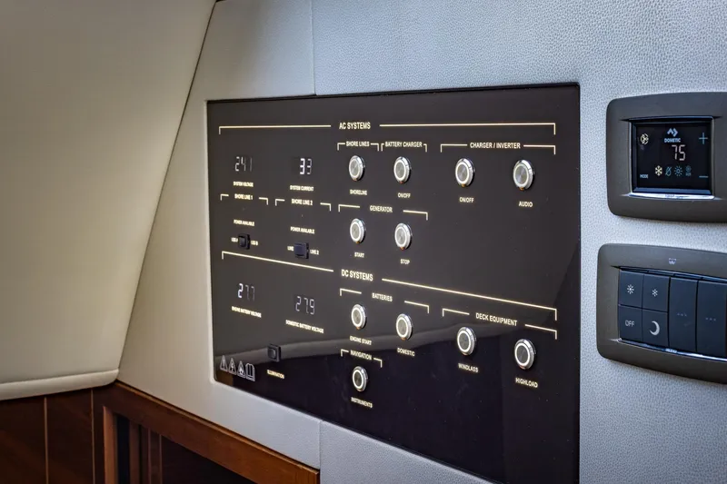 Her Way Yacht Photos Pics Control panel of 2023 Princess Y72 yacht, featuring AC and DC systems.