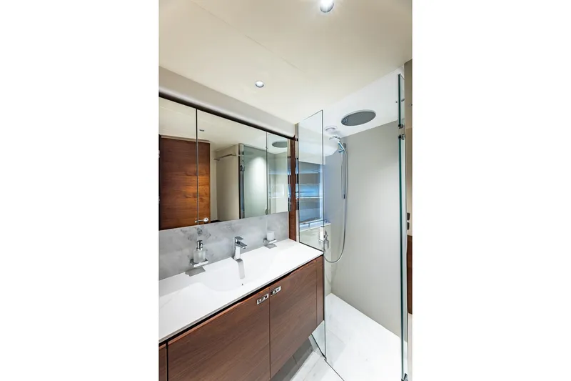 Her Way Yacht Photos Pics Luxurious bathroom in 2023 Princess Y72 yacht with modern fixtures and elegant design.