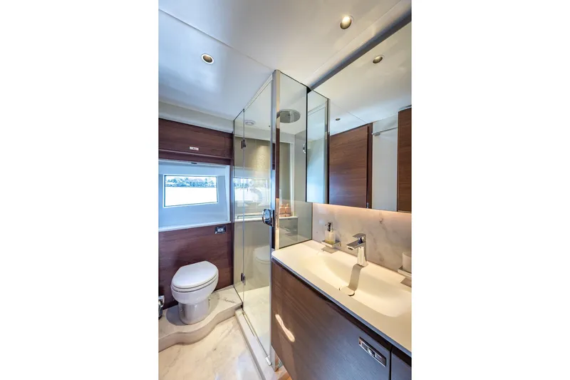 Her Way Yacht Photos Pics Luxurious bathroom in 2023 Princess Y72 yacht with modern fixtures and elegant design.