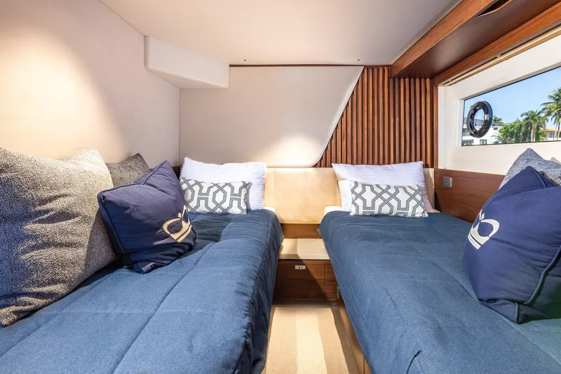Her Way Yacht Photos Pics Luxurious cabin interior of 2023 Princess Y72 yacht with twin beds and elegant decor.