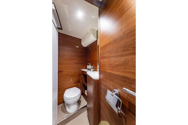 Her Way Yacht Photos Pics Luxurious wooden bathroom interior on 2023 Princess Y72 yacht.