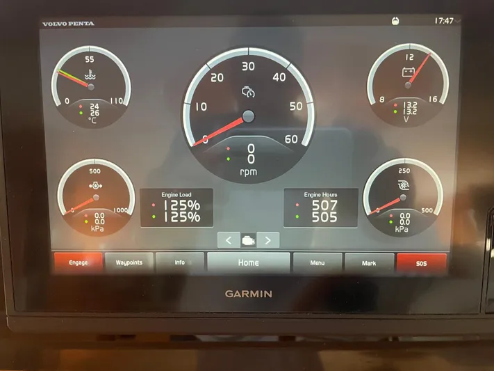 Kishta Yacht Photos Pics Garmin display showing engine metrics on a 2009 Fountaine Pajot Cumberland 46.