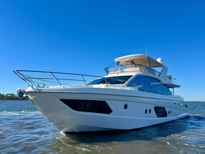  Yacht Photos Pics Luxury Absolute 72 FLY yacht cruising on a sunny day, 2016 model.