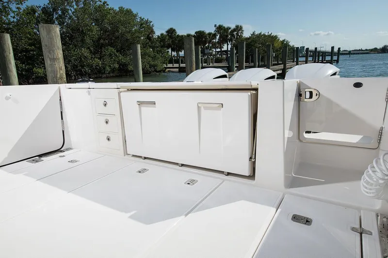  Yacht Photos Pics Manufacturer Provided Image: 2020 Pursuit S 368 Sport boat deck with storage compartments and outboard motors.