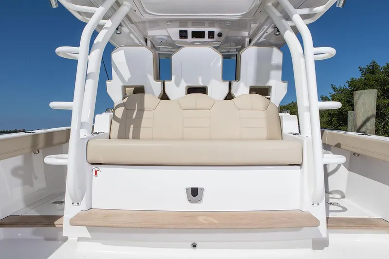  Yacht Photos Pics Manufacturer Provided Image: 2020 Pursuit S 368 Sport boat with beige seating and white frame.