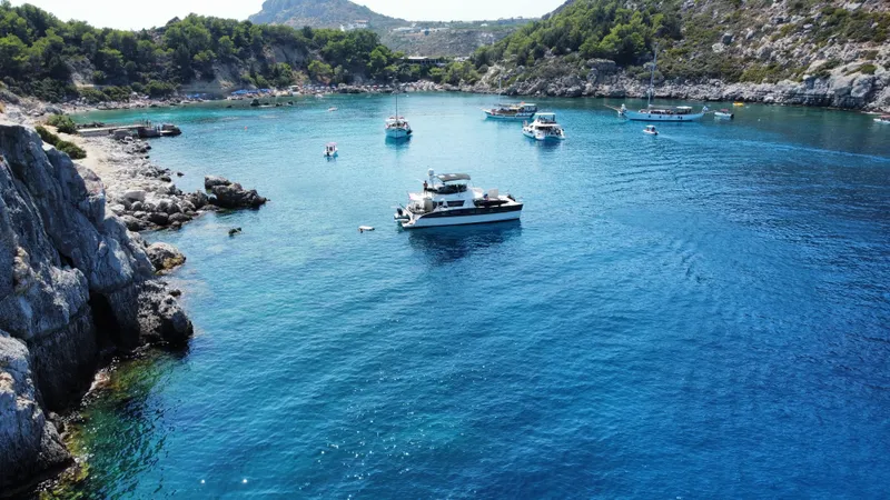 Kishta Yacht Photos Pics Aerial view of a 2009 Fountaine Pajot Cumberland 46 yacht in a scenic bay.