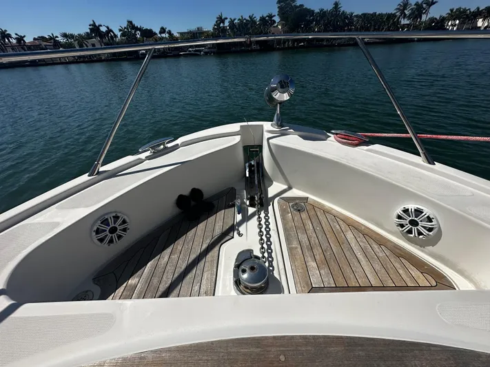  Yacht Photos Pics Bow view of 2006 Chris-Craft 43 Roamer yacht with teak decking and anchor chain.