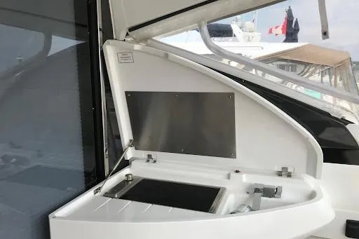  Yacht Photos Pics 2021 Fairline Targa 45 GT yacht with open storage compartment.