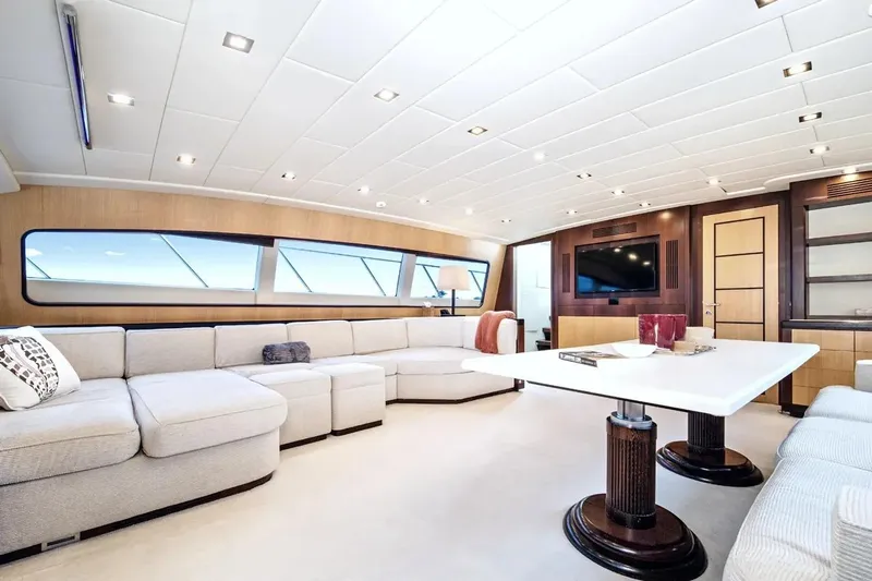Daya Yacht Photos Pics Luxurious interior of 2007 Mangusta 105 yacht with modern furnishings and elegant design.