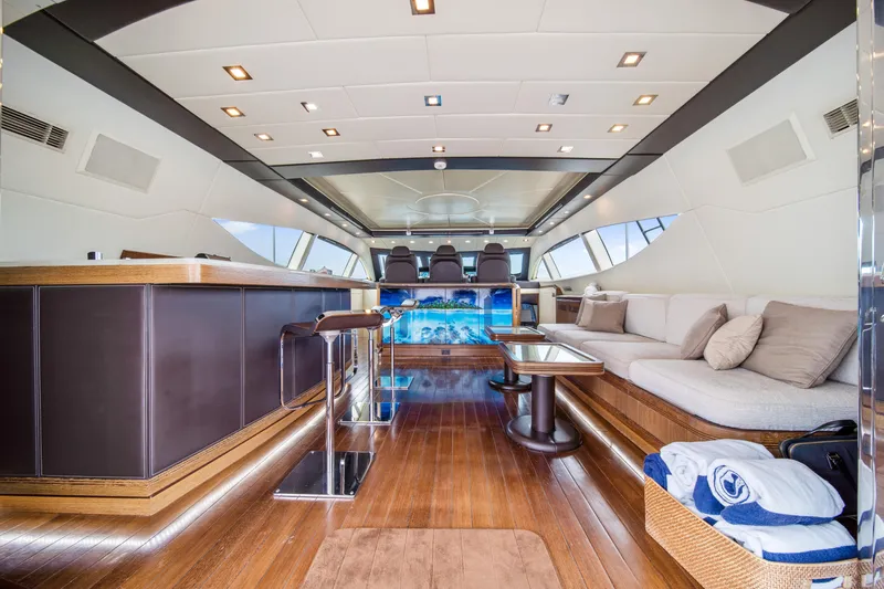 Daya Yacht Photos Pics Luxurious interior of 2007 Mangusta 105 yacht with elegant seating and modern design.