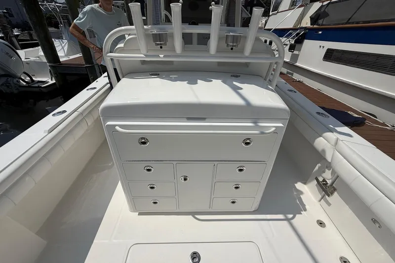 Yacht Photos Pics 2018 Regulator 31 boat interior with storage compartments and rod holders.