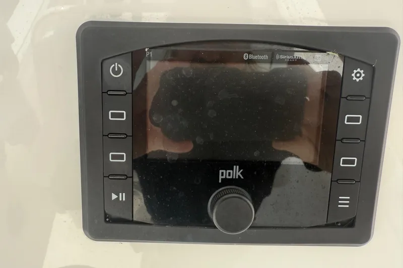  Yacht Photos Pics Polk audio control panel on 2018 Regulator 31 boat, featuring Bluetooth and SiriusXM capabilities.